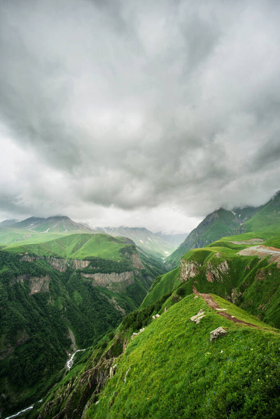 Peaks and slopes of the Caucasus Mountains in Georgia - Foto, afbeelding