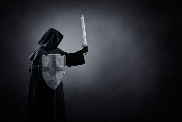 Dark knight with sword and shield in the dark - Zdjęcie, obraz