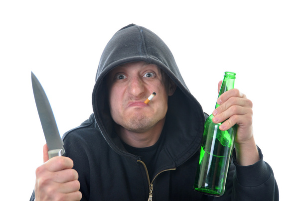 Бандит с ножом и бутылкой спирта изолированы
 - Фото, изображение