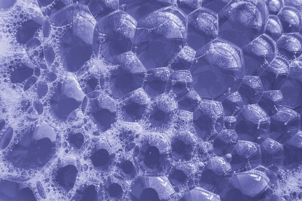 Minimalist purple soap bubbles. Abstract very peri water wallpaper. - Photo, Image