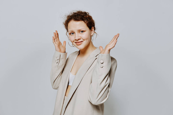 cheerful woman in a suit gestures with his hands Lifestyle unaltered - Φωτογραφία, εικόνα