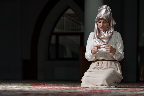 Muslim Woman Is Praying In The Mosque - Фото, изображение