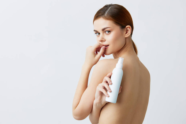 portrait woman body lotion rejuvenation cosmetics isolated background - Photo, Image