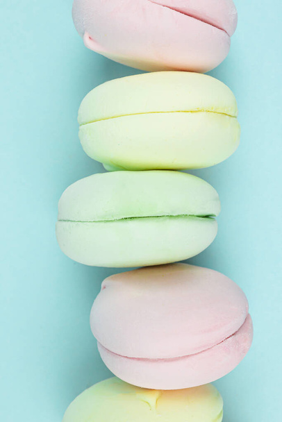 Close up Multi Colored Stacked Up marshmallow looks like French Macarons on Blue - Foto, immagini