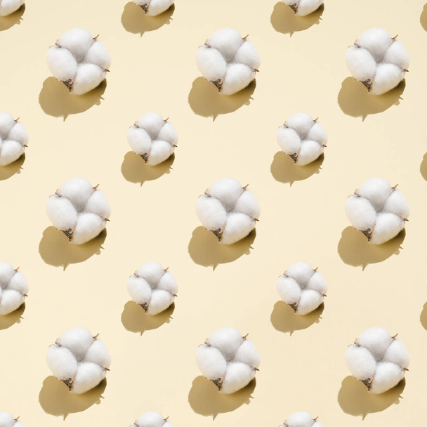 Cotton pattern on a light beige background. - Photo, Image