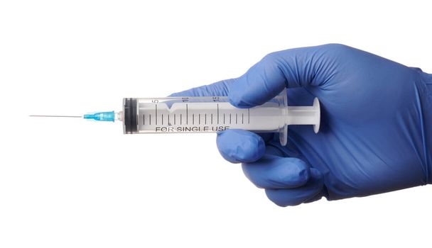 Medic Hand Prepares Syringe for Vaccine Shot - Isolated Photo - Foto, imagen