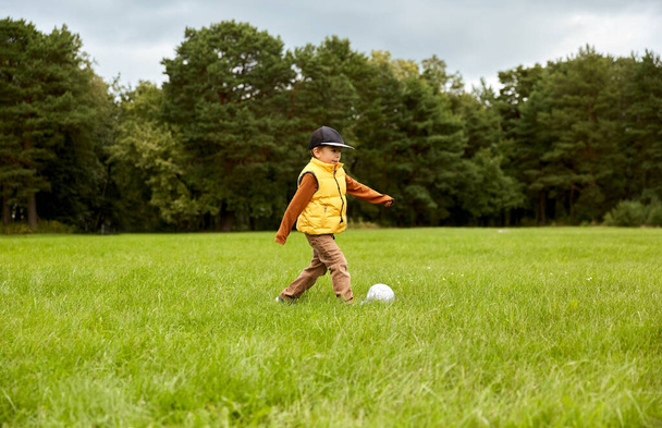 little boy with soccer ball at park - Фото, зображення