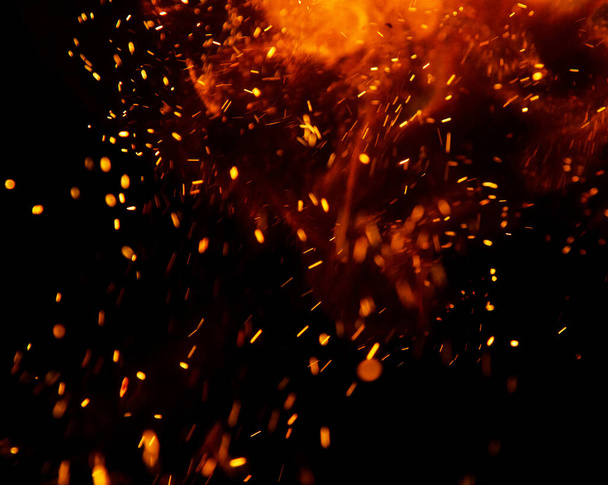 fire flames with sparks on a black background - Photo, Image