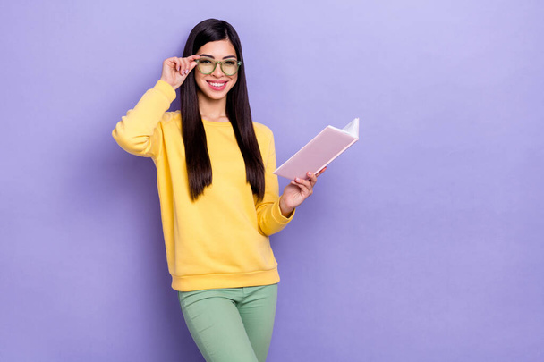 Photo of young cheerful lady eyewear courses lecture academic college isolated over violet color background. - Foto, Imagen