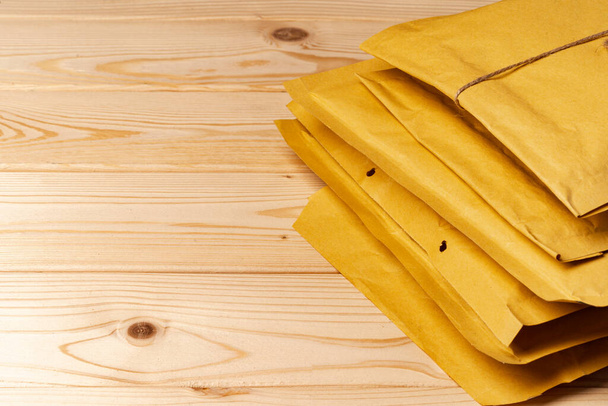 Close up shot of stack of padded mailing envelopes - Фото, изображение