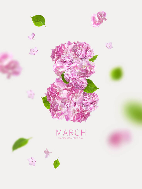 Numeral 8 from beautiful pink hydrangea flowers, green leaves on gray background. International Women's Day. Minimalistic concept 8 March holiday. Flower Greeting card for women, floral. - Photo, image