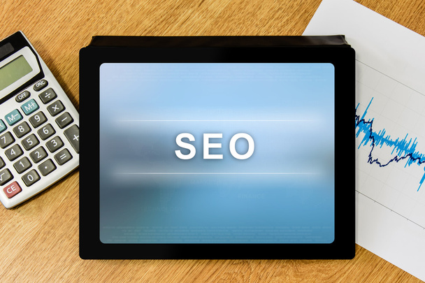 SEO or search engine optimization word on digital tablet - Photo, Image