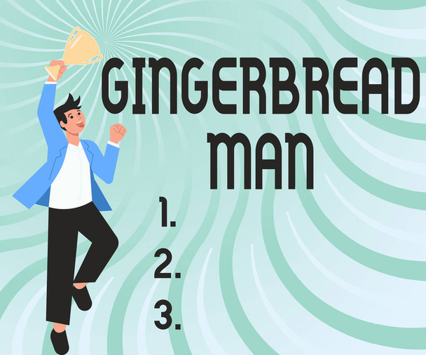 Signe montrant Gingerbread Man. cookie Internet Concept en pain d'épice généralement sous la forme de Gentleman humain sautant avec enthousiasme tenant Trophée montrant des réalisations. - Photo, image