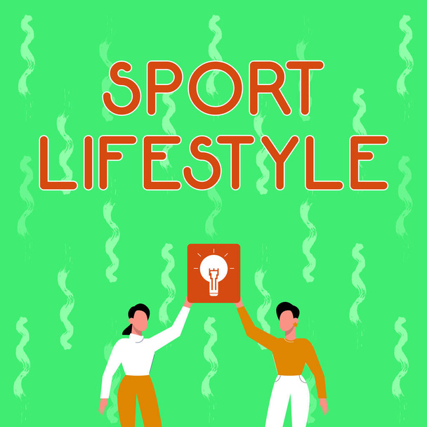Käsinkirjoitusmerkki Sport Lifestyle. Internet Concept Fond urheiluun tai ulkoiluun Fyysisesti aktiivinen Kaksi kollegaa Holding Lamppu esittelee uuden saavutuksen. - Valokuva, kuva