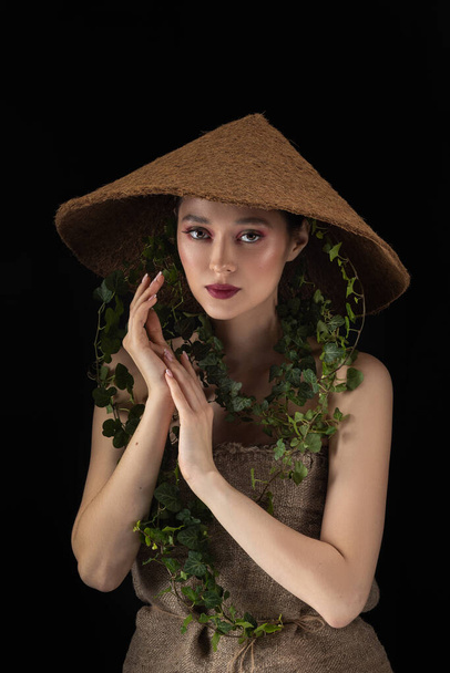 Beauty Spring or Woman with Fresh green leaves hat. Nature Girl portrait - Fotoğraf, Görsel