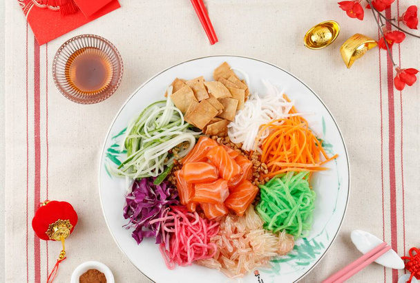 Čínský Nový rok Lou Sang Yusheng Traditional Food Celebration for Blessing on Chinese New Year or Lantern Festival, Top View  - Fotografie, Obrázek