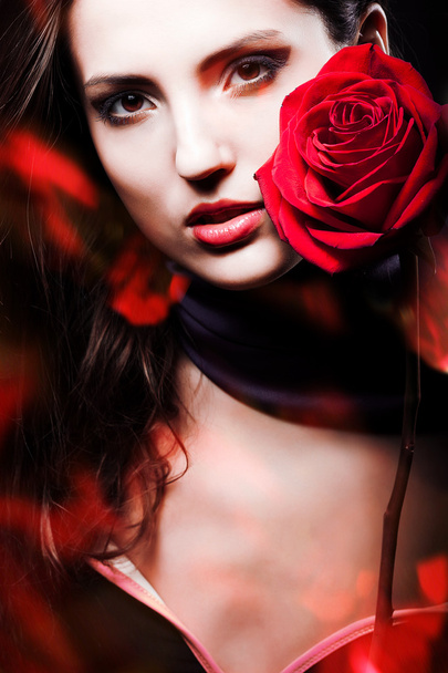 woman with red rose - Фото, зображення