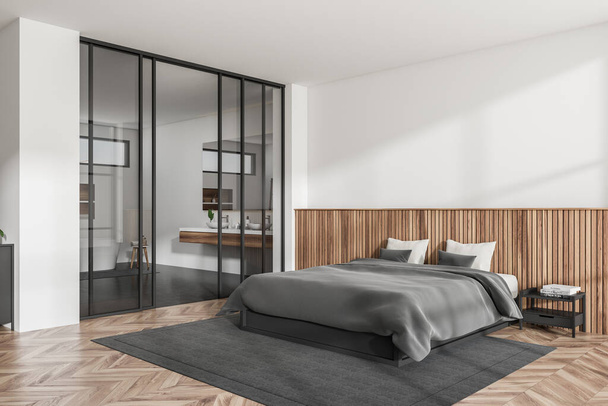 Bright bedroom and bathroom interior with bed, bathtub, bedside, mirror, glass partition, white wall, hardwood floor, sinks, carpet, pillows. Concept of contemporary apartment design. 3d rendering - Fotografie, Obrázek