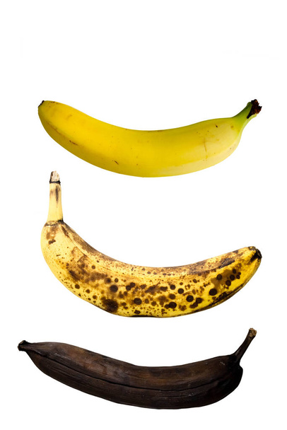 Banana ripeness level, from fresh to rotten on white background - Zdjęcie, obraz