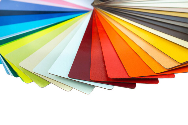 Color guide displaying a range of hues for use in interior design and decoration. Colorful color guide with palette of paint samples on white background with copy space. Catalog for tinting - Φωτογραφία, εικόνα