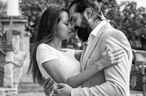 Deep in love. man and woman on romantic date. romance. young family relations. loving relationship. girlfriend with her boyfriend. happy valentines day. stylish couple in love embrace outdoor - Foto, Imagen