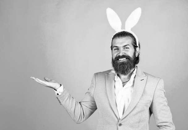Man in bunny ears. rabbit man wear hare ears. bunny hunt begins. happy hipster with beard. Man in rabbit ears. Preparation for Easter. concept of egg hunt. Easter celebration concept. Spring holidays - Foto, imagen