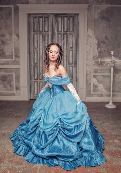 Beautiful medieval woman in blue dress  - Photo, Image
