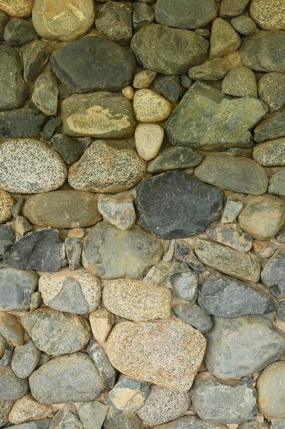 Kuva erikokoisia ja vaihtelevasti värillisiä kiviä on täydellinen sekä kuvio ja rakenne rakennusmateriaalien tai maiseman suunnittelu. - Valokuva, kuva