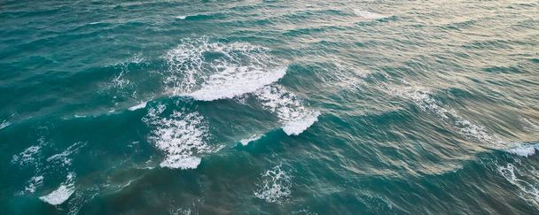 Foamy sea waves aerial view - Foto, afbeelding
