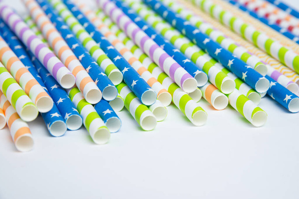 Colorful helical or striped paper straws isolated on white background including clipping path. - Photo, Image