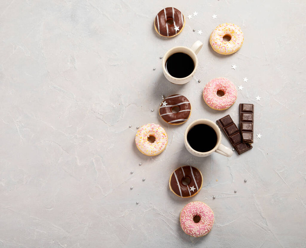 fresh donut with coffee on grey background, copy space - Foto, Imagem