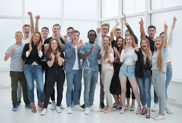 team of happy young people standing together - Foto, Bild