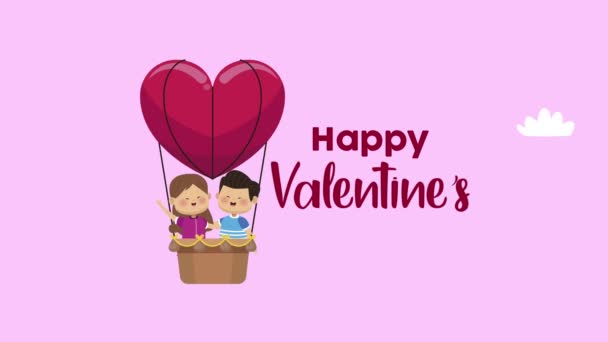 feliz día de San Valentín letras con pequeños amantes en globo - Metraje, vídeo