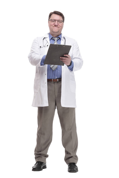 in full growth. qualified doctor with a clipboard. - Fotografie, Obrázek