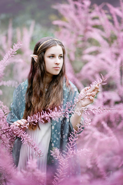 fairy tale girl. Portrai of mystic elf woman. - Фото, изображение