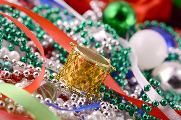 Christmas decorations, new year invitation card, drums, pearls and xmas balls - Φωτογραφία, εικόνα