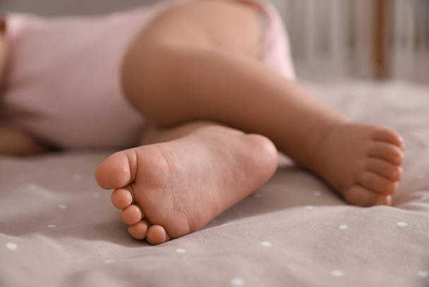 Adorable little baby sleeping on bed at home, closeup - Photo, Image