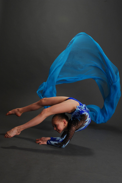Young girl doing gymnastics - Фото, изображение
