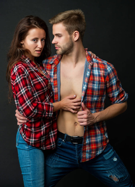 relationship of young girl and guy on black background, togetherness - Foto, Bild