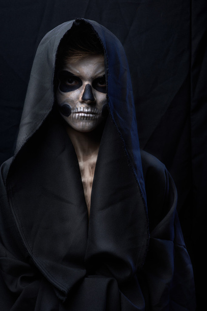 teenager with makeup skull cape - Photo, Image