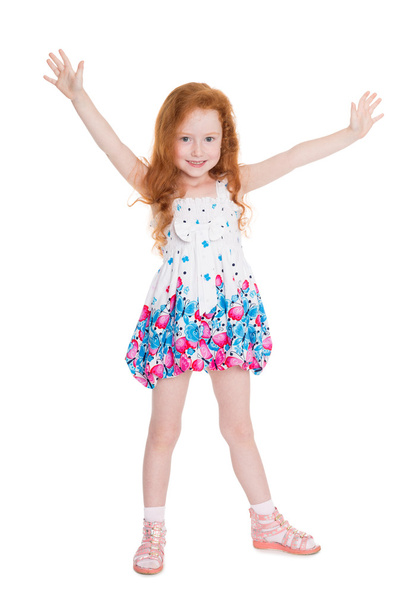 Little girl with her hands raised  - Foto, Imagen