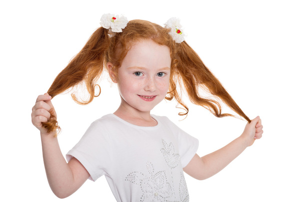Playful little girl holds hands hair - Фото, зображення