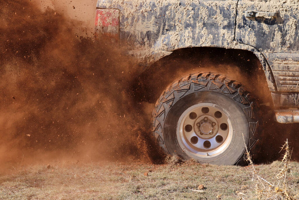 off-road racing on dusty terrain - Photo, Image