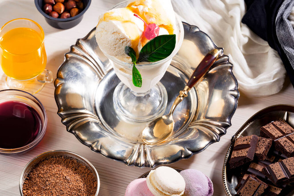 Ice cream on the table on a bright, colored background - Photo, Image