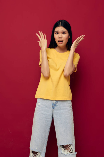 woman yellow casual t shirt smile posing isolated background unaltered - 写真・画像