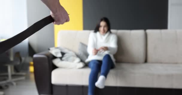 Abuser man hitting wife with leather belt at home 4k movie - Footage, Video