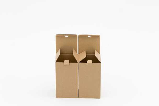 Two open cardboard boxes on a white background - Foto, afbeelding
