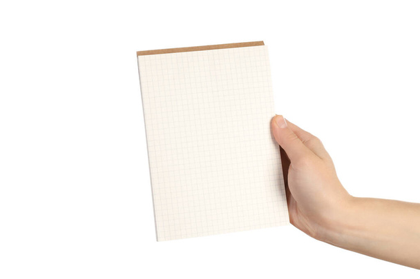 Жіноча рука тримає блокнот, ізольований на білому тлі
 - Фото, зображення
