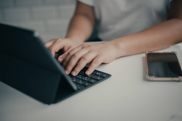 Female hands on keyboard ,Female freelance working business at home - Фото, зображення