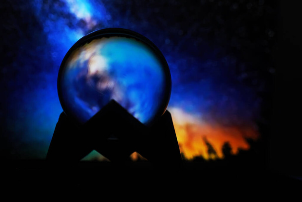 Milky way in magic sphere,Fortune teller,mind power concept. magic ball predictions. mysterious composition. Fortune teller, mind power, prediction concept. copy space - Photo, Image